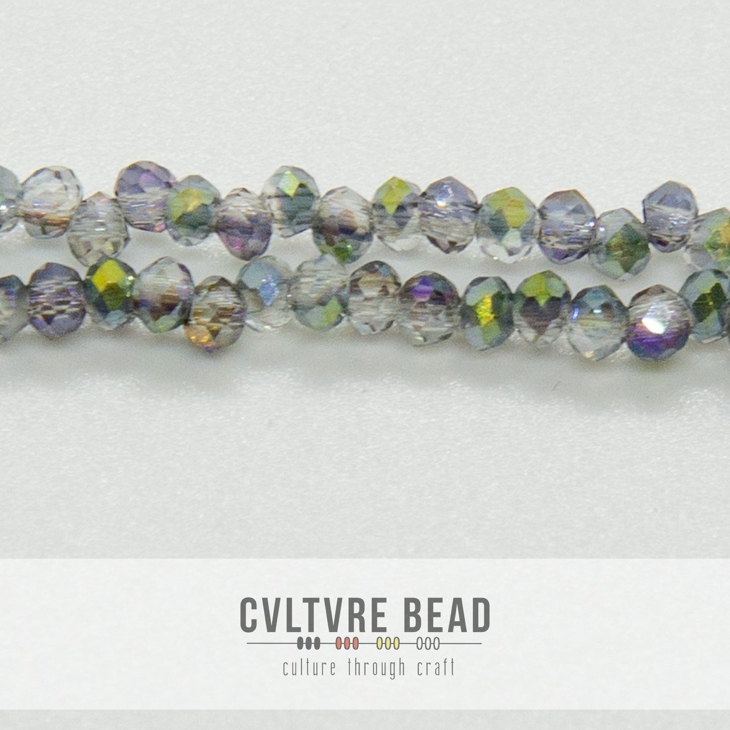 Crystal Lane Rondelle - 1.5x2.5mm - Trans. Rose Green Luster