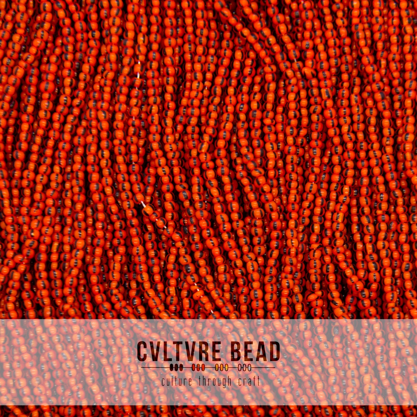 Czech Seed Bead 12/0 - Red Orange/Black Striped - 1 Hank