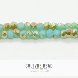 Crystal Lane Rondelle - 1.5x2.5mm - Turquoise Blue w/Half Champagne Luster