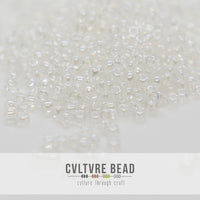 Toho SB 11/0 - Rainbow Crystal/Creme Lined
